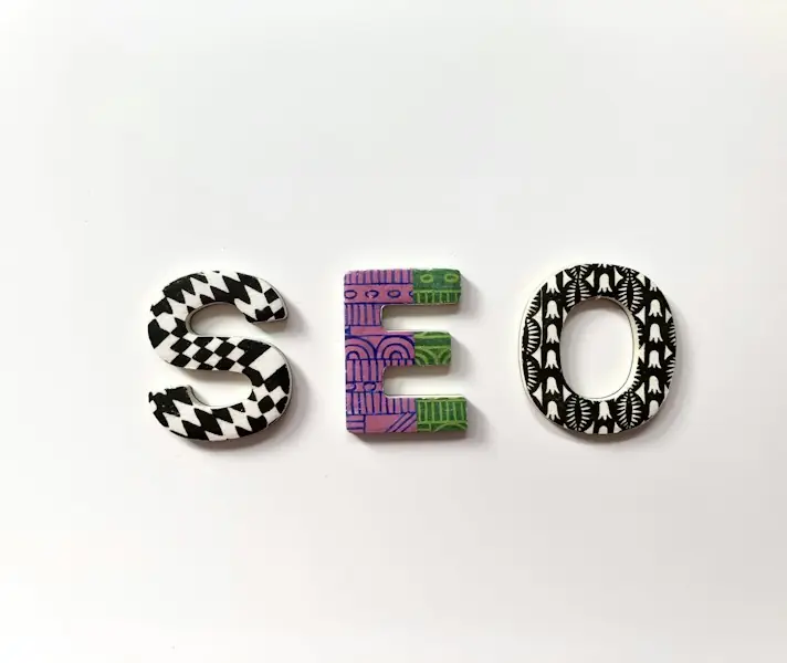 Patterned letters spelling SEO on a white background