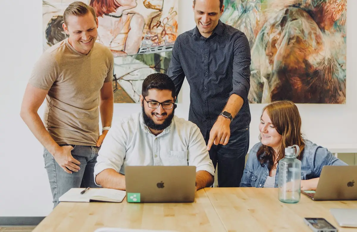 Designers and developers collaborating in a studio